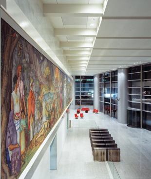 General illumination for the double-height lobby entry is made possible by 35W ceramic HID downlights.