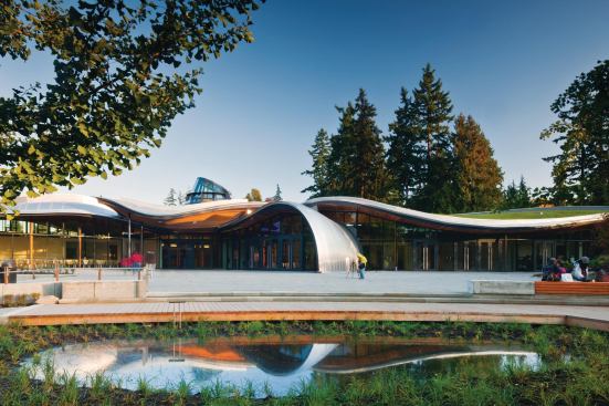 The curvilinear forms of the roof of the VanDusen Botanical Garden Visitor Centre  are sheathed in aluminum where not covered by an extensive green roof.