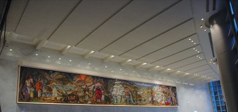 A mural depicting Mexican themes painted by Mexican artist Juan O'Gorman (1905-1982) is accented by 250W PAR38 incandescent fixtures that comply with museum and artwork illumination guidelines. Ambient light in the winter garden supplied by 35W ceramic HID downlights does not compete with the spectacular views of the mountains that surround Mexico City (left, bottom).