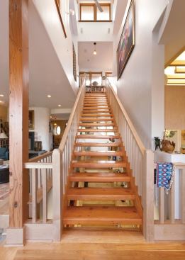 The main stair is composed of salvaged trestle bridge timbers.