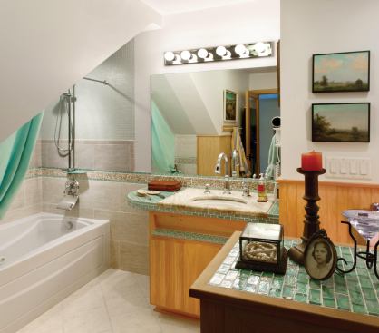 Found objects such as scavanged sinks, recycled tile, and reclaimed wood fill the house with interest and warmth.