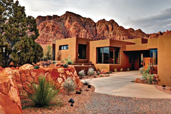 The judges appreciated how the house respects its site and is built around existing trees, boulders, and vegetation while making the most of the impressive canyon views.