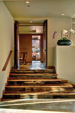To better accommodate the multi-level site, the floor plan steps up in two areas.
