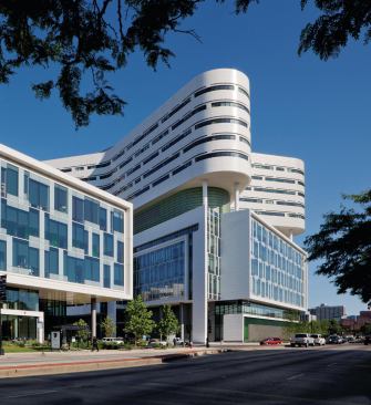 Separating the patient tower above from the diagnostic platform below is a recessed mechanical level which contains all of the utilities for the building. In the remaining exterior space on this level, green roofs serve as gardens for the staff. Inside the mechanical rooms, condensate is reclaimed for irrigation water as part of a strategy that has contributed to a LEED Gold rating.