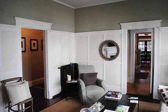 The original view from the living room into the kitchen. The kitchen cabinetry and trim pay homage to the 1917 home's original millwork.