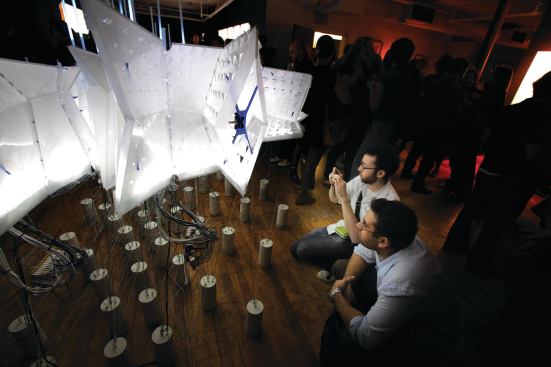Also designed for a 2009 exhibition at the Van Alen Institute, Aurora, like Glaciarium, highlights the global warming crisis. The exhibit, composed of a web of cables, LEDs, and tensile elements, is a spatial representation of the Arctic landscape that includes real-time data on ice field movement. The project lights up in response to viewers—a metaphor for our complicity in climate change.