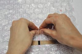 To help visualize the three-dimensional quality of the surface, the team went through a prototyping process that involved popping bubble wrap over a pattern of planned raised, flat, and depressed dots.