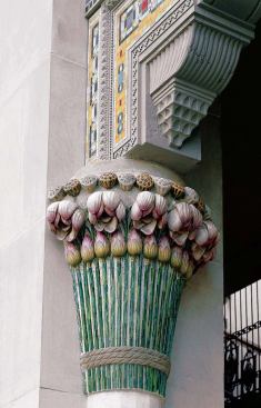 From the loggia to the Daffodil Court, profusions of flowers ornamented column capitals in glass and terracotta relief.