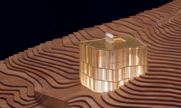 The house will be anchored in the hillside like a faceted crystal, with sliding steel-rod screens inside to control privacy and views.