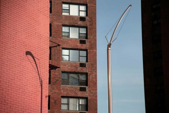 For the City Lights competition, Phifer's team devised a sleek, cast-aluminum arm fixed atop an extruded aluminum pole, marrying function and aesthetics.