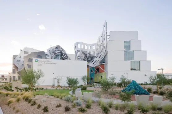 Although architect Frank Gehry's sources are never strictly literal or singular, sand dunes of the desert suggested the twisting volumes of the four-story event hall.