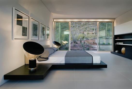 Light bars run along the top of the operable window walls so that the glazing doesn't become reflective at night. 