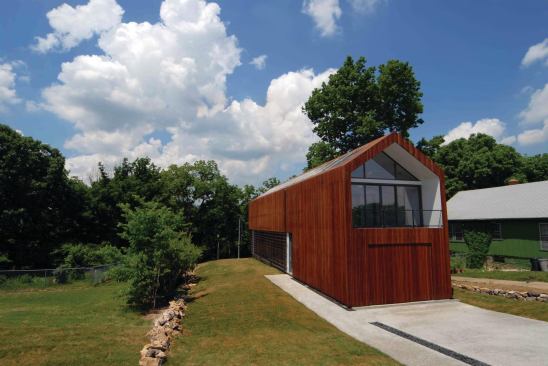Eastern facade with garage door.