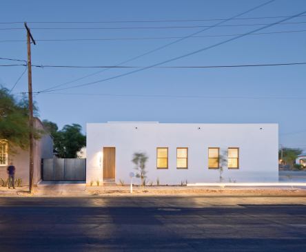 The neatly composed street elevation barely hints at what lies within.