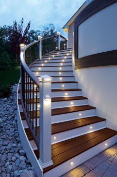 Trex. The composite deck manufacturer now offers dimmable LED deck lighting, for an energy-efficient way to add safety and ambiance. The compact, weather-proof lights use 75% less energy than traditional incandescent lighting and last for up to 40,000 hours, the company says. Four styles are offered: a post cap light for a warm downward glow; a deck rail light; a flush-mounted riser light available in white, black, and bronze; and a recessed deck light, which installs flush into the deck for subtle accents. 800.289.8739. www.trex.com. Booth #W2571.