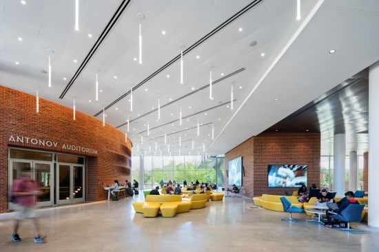 Seating and informal lounge areas located near the entrance to one of the auditoriums