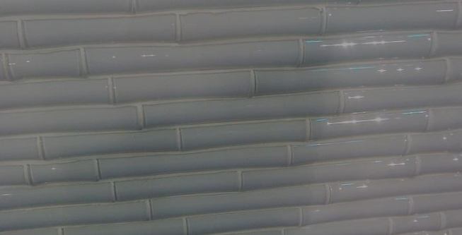 Bamboo is a glass tile collection that offers color and texture. The fused-glass line is produced with the color baked in, so it will not fade over time. Tiles are back-filled with mortar for easy installation and come in eight standard colors and over 100 custom colors. 
www.voguebay.com.