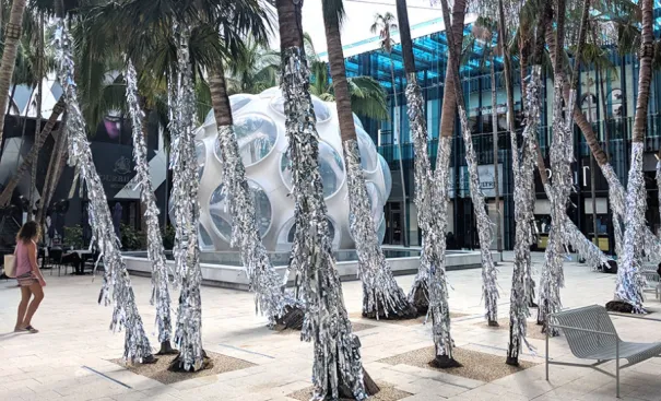 For the holidays, Charlap Hyman & Herrero covered the trees with tinsel.