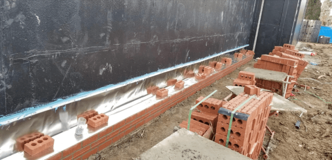 Installation of flexible stainless steel flashing courtesy of York Flashings.